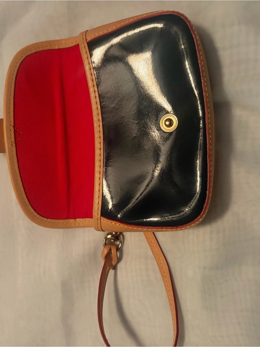 Dooney and Bourke Navy and Tan Patent Wristlet